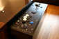 Close up of the arcade control panel on walnut Double7